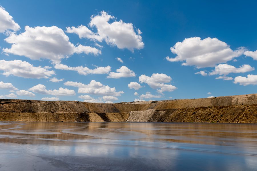 Tailings dams blue sky with clouds